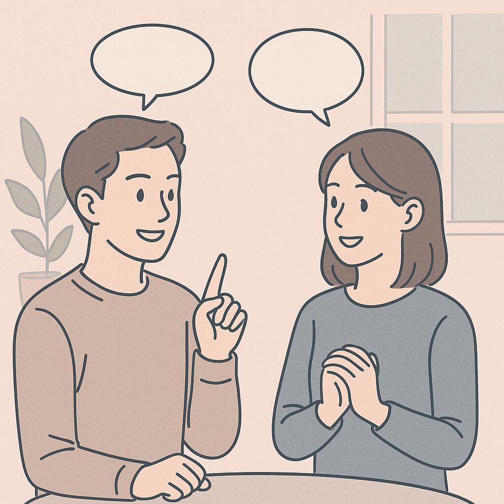 カフェで向かい合って話をしている男女
