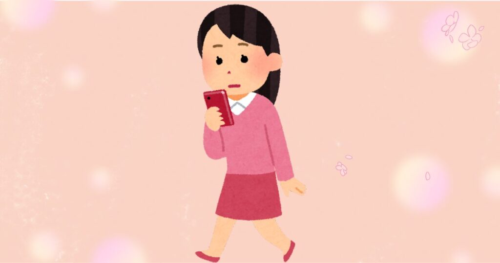 スマホをみながら考えている女性